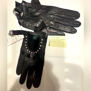 Beautiful leather lamb skin gloves. New/never worn. Size 7
